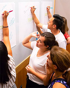 students using whiteboard