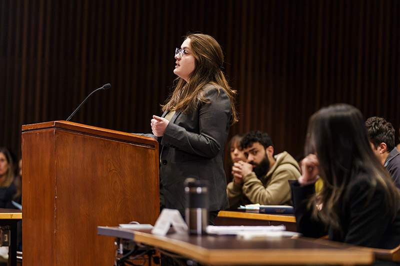 Kira Marie Nikolaides at podium