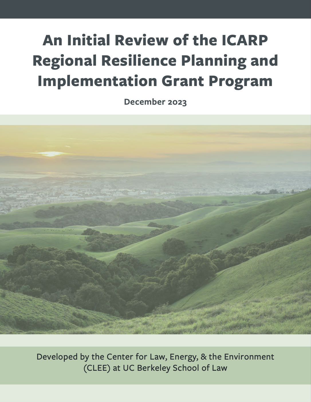 Report cover. Top reads, "An Initial Review of the ICARP Regional Resilience Planning and Implementation Grant Program,." Includes picture of rolling green hills.
