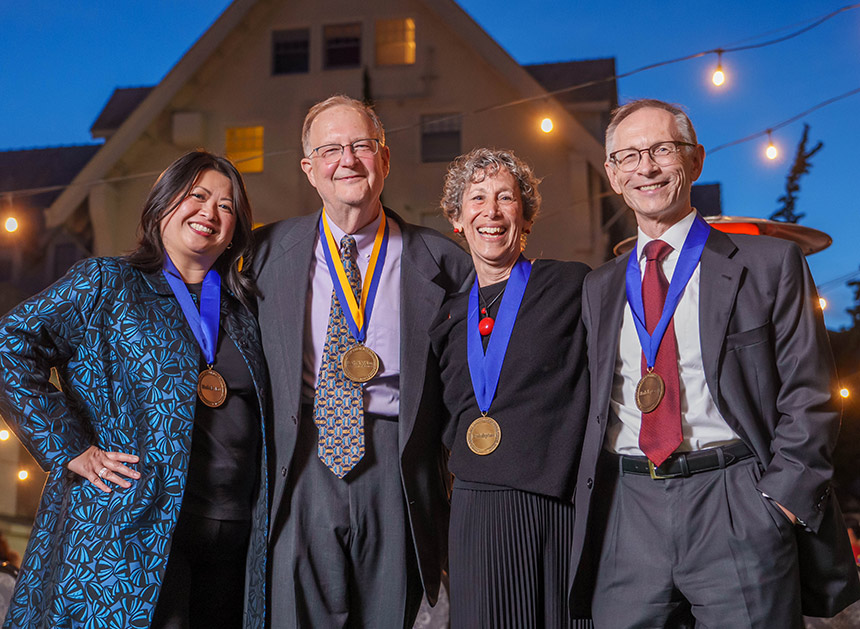 (From left) Young Alumni Award winner Tam Ma 