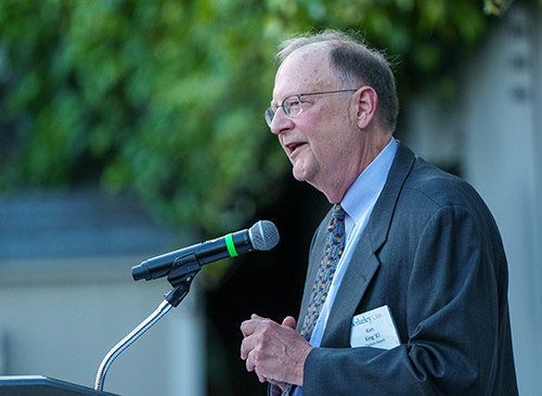 Kenton King '87 at podium