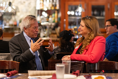 Chemerinsky talks with Chenega Corporation Deputy General Counsel Serena Green '15. Photo by Nathaniel Wilder 