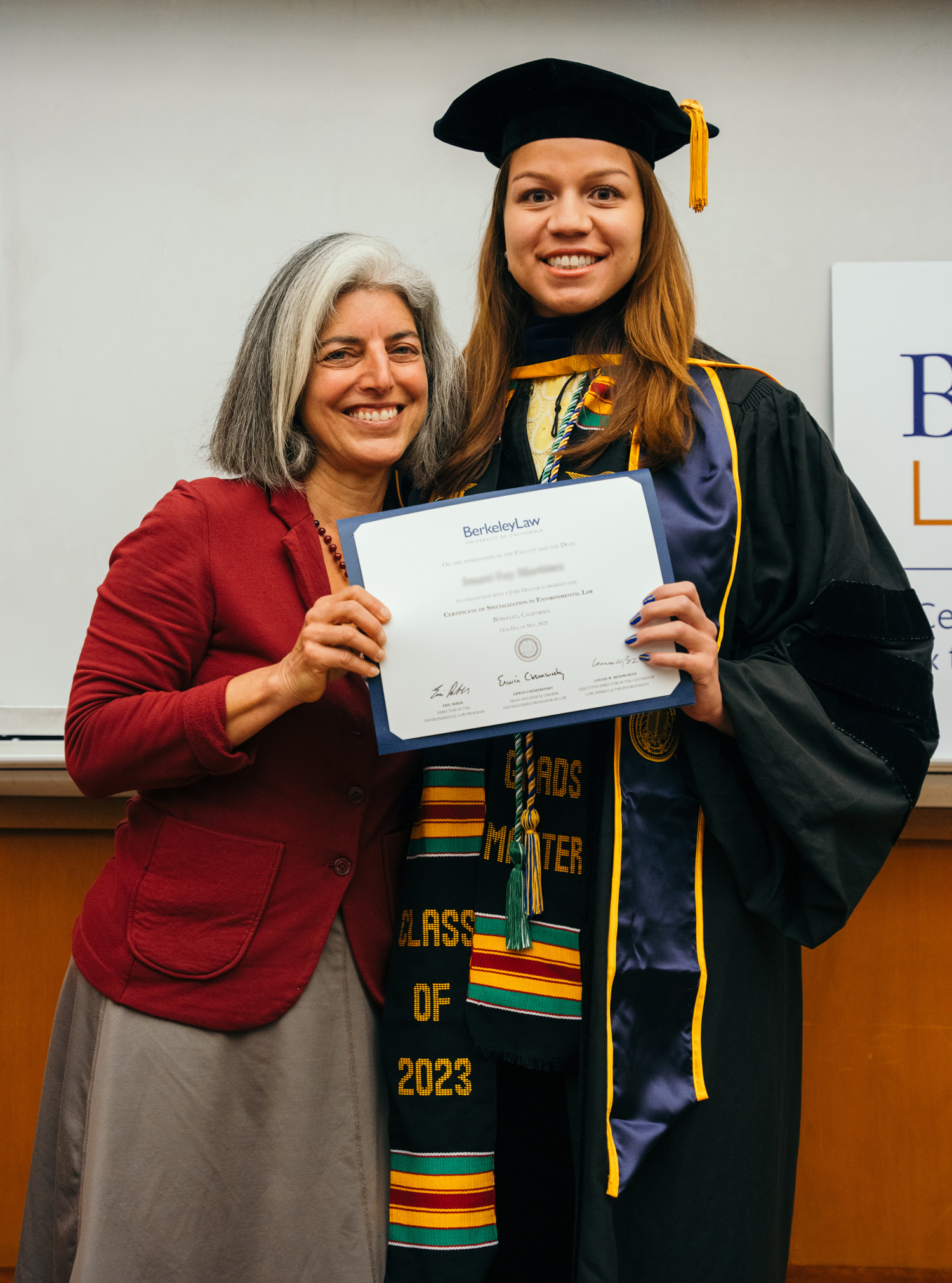 Claudia Polsky presenting certificate for Environmental Law to student