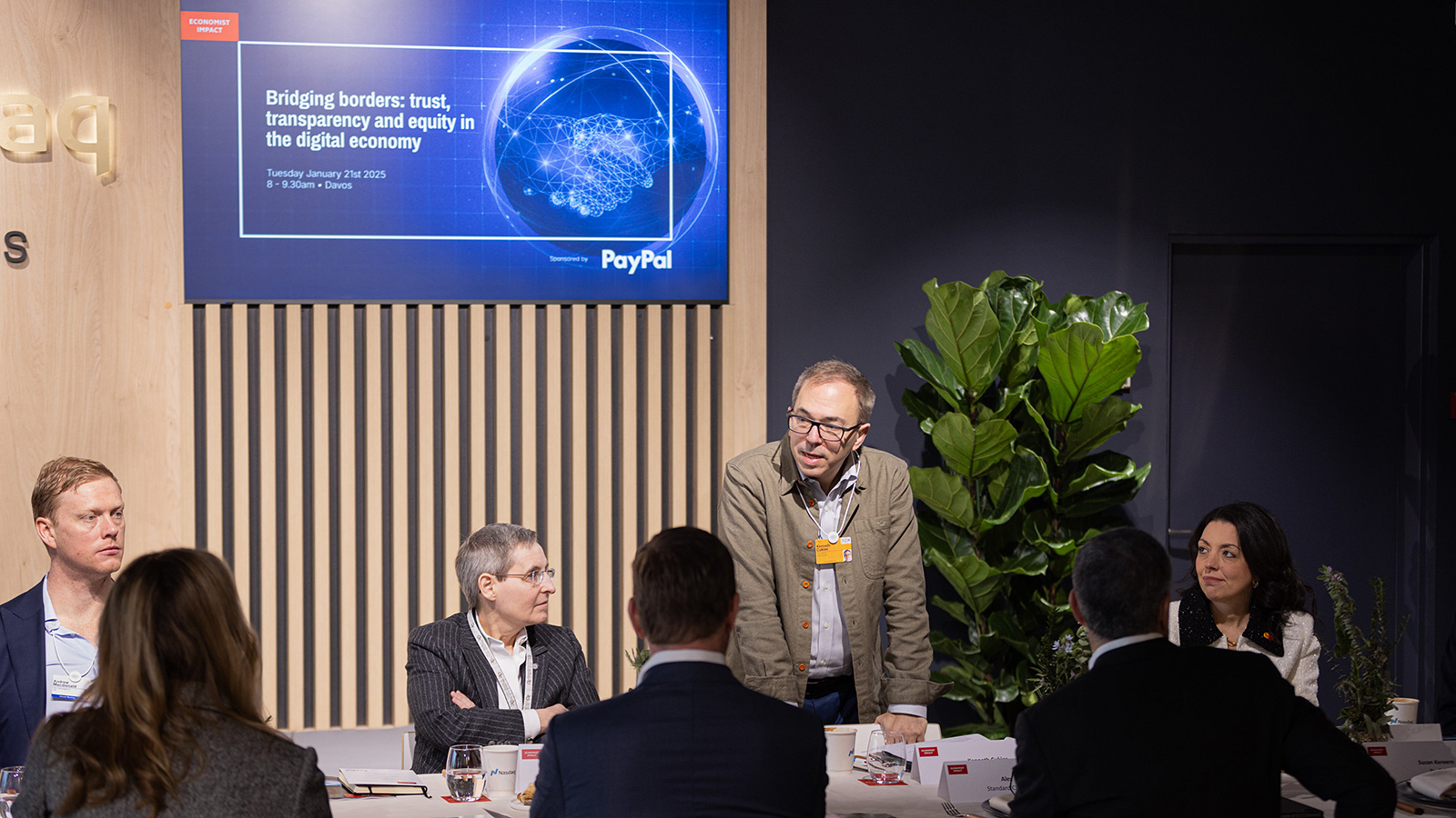 People in discussion around a table