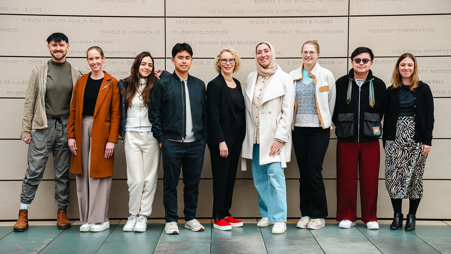 Students and faculty posing outside